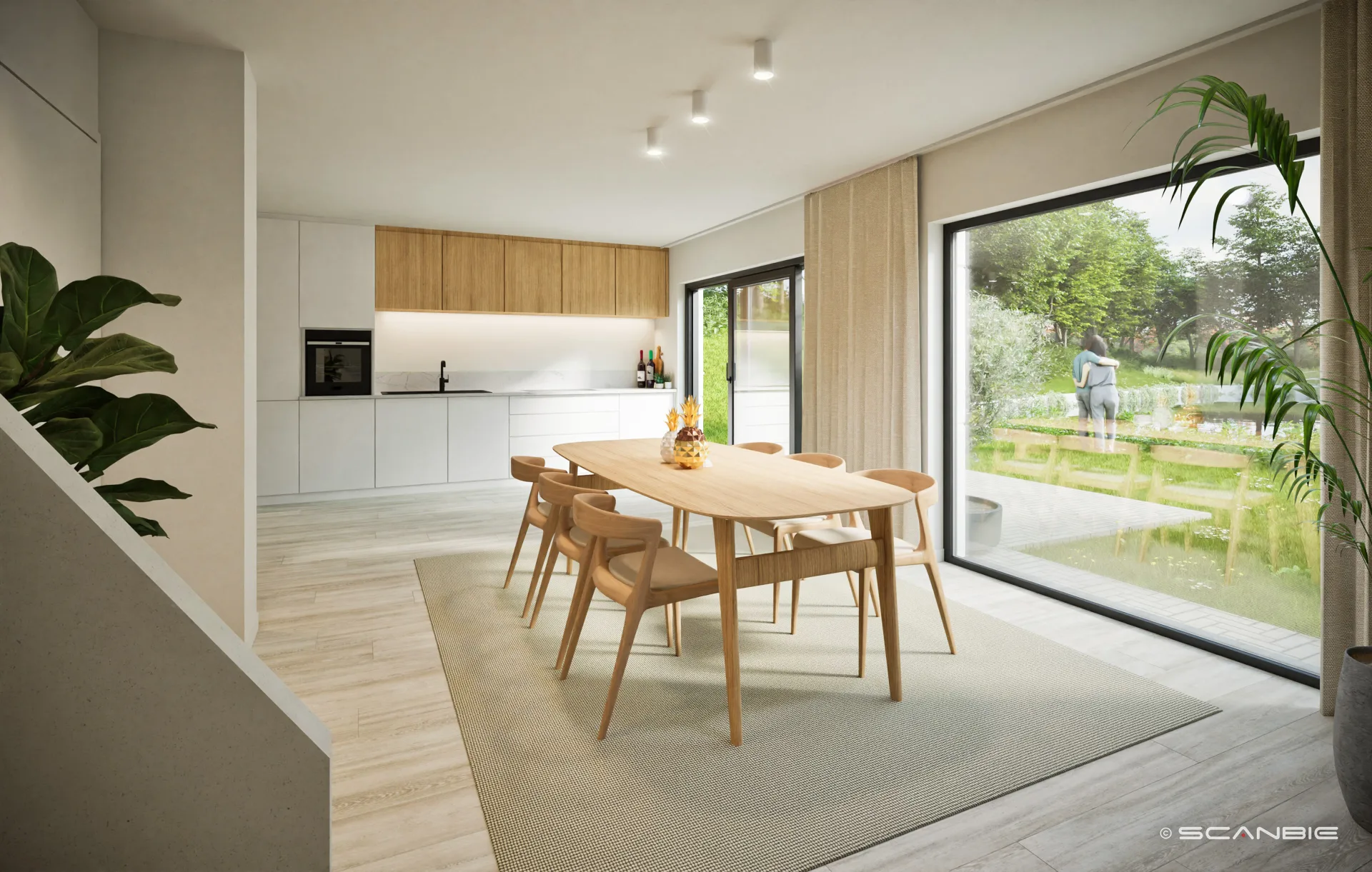 Open leefkeuken met eetkamer en grote raampartij naar de tuin bij Eden Roc