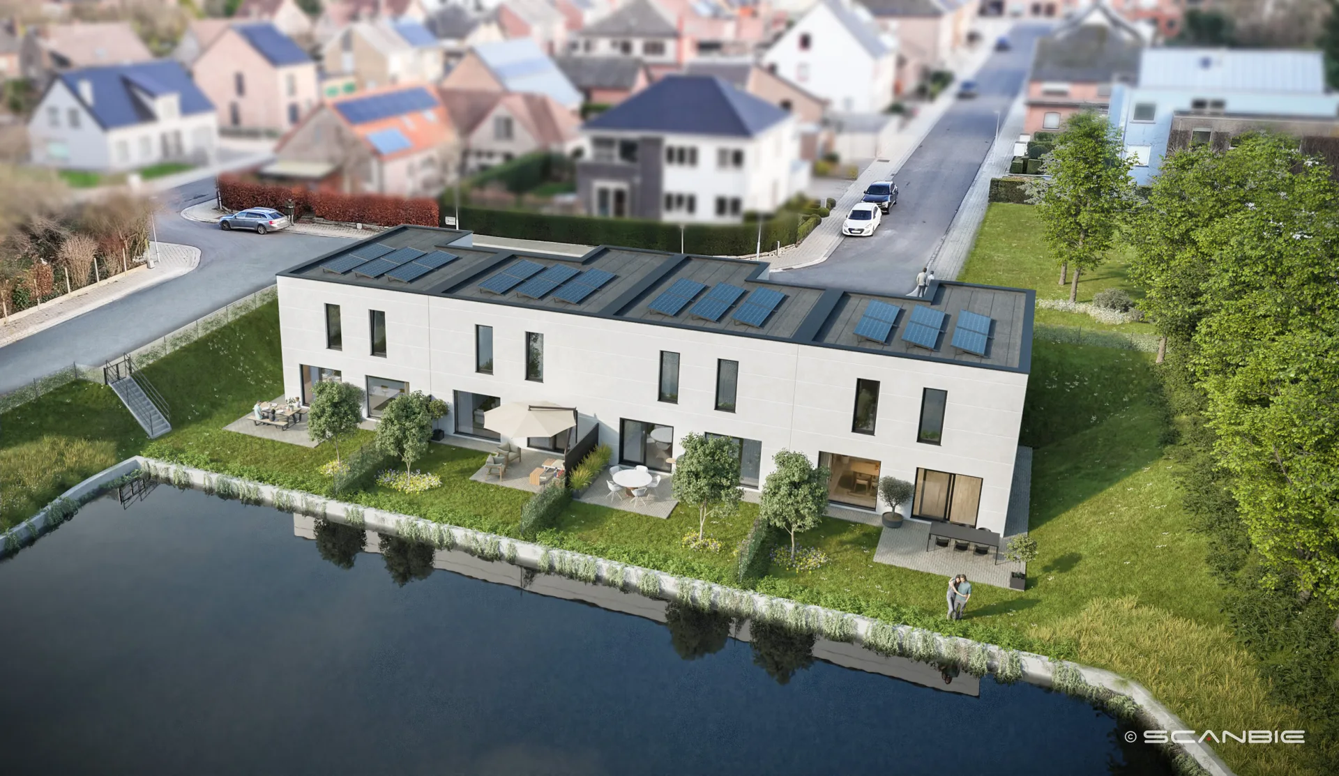 Luchtfoto van het Eden Roc project in Lede met zonnepanelen en waterpartij